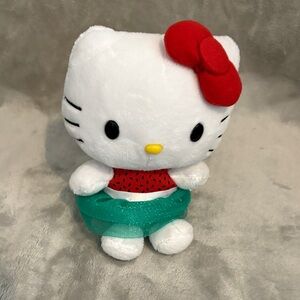 Hello Kitty Plush with Red Bow and Teal Skirt
(Watermelon)